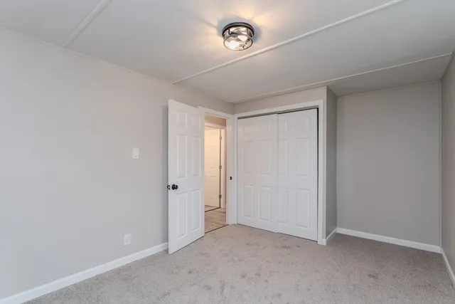 an empty room with a door