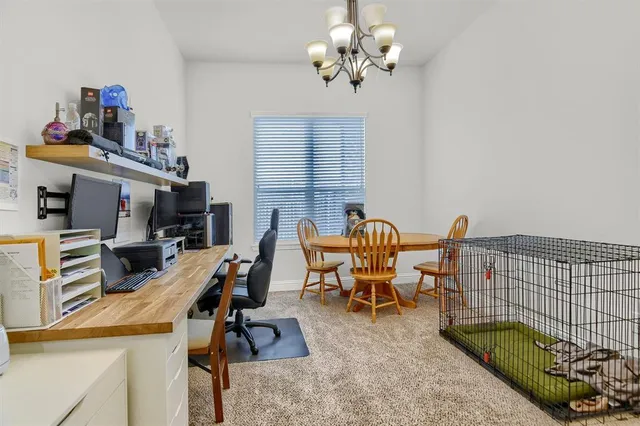 a view of a workspace with furniture