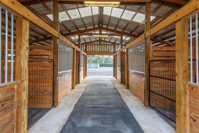 a bathroom with a window and a shower