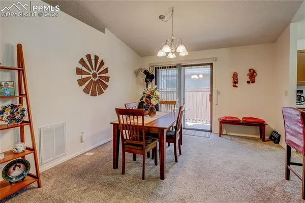 a view of a dining room with furniture