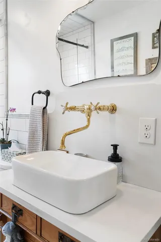a bathroom with a bathtub and a sink