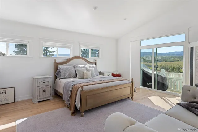 a bed room with a bed and a couch