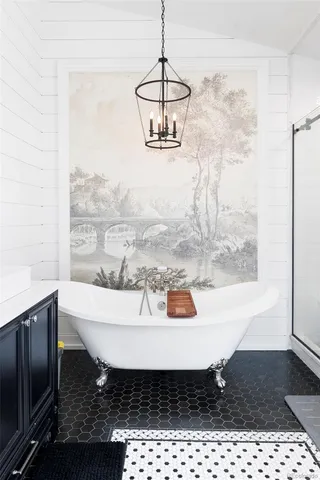 a dining room with a table and chairs