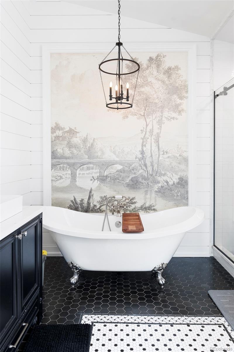 2073 South Perry Park Road Sedalia, CO 80135 - Photo 20 of 41 a dining room with a table and chairs