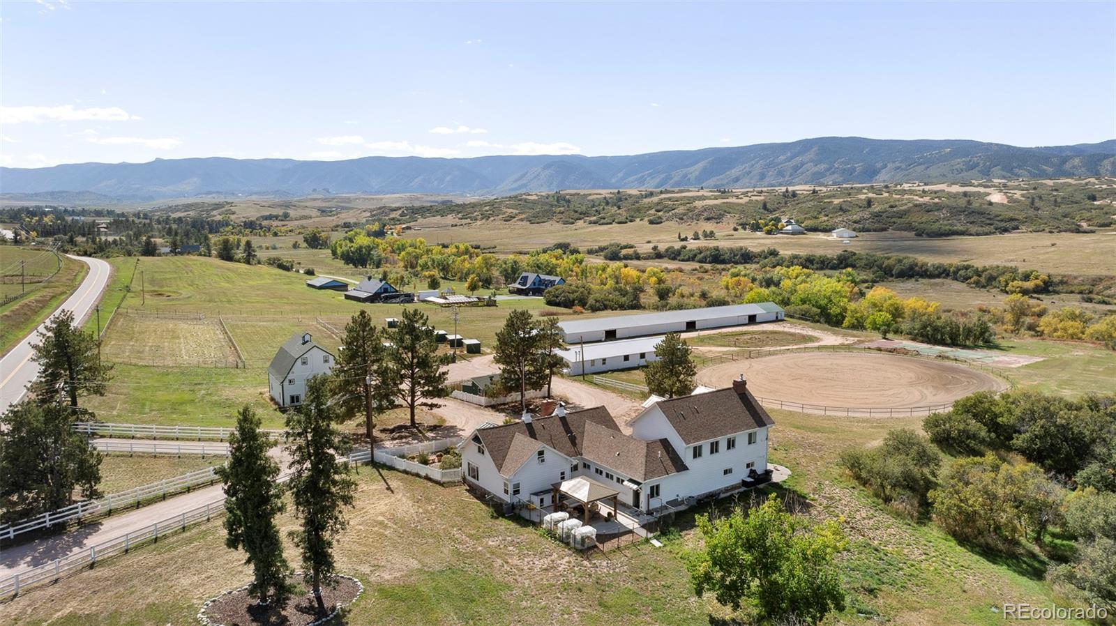 2073 South Perry Park Road Sedalia, CO 80135 - Photo 39 of 41 an aerial view of residential house with outdoor space and river
