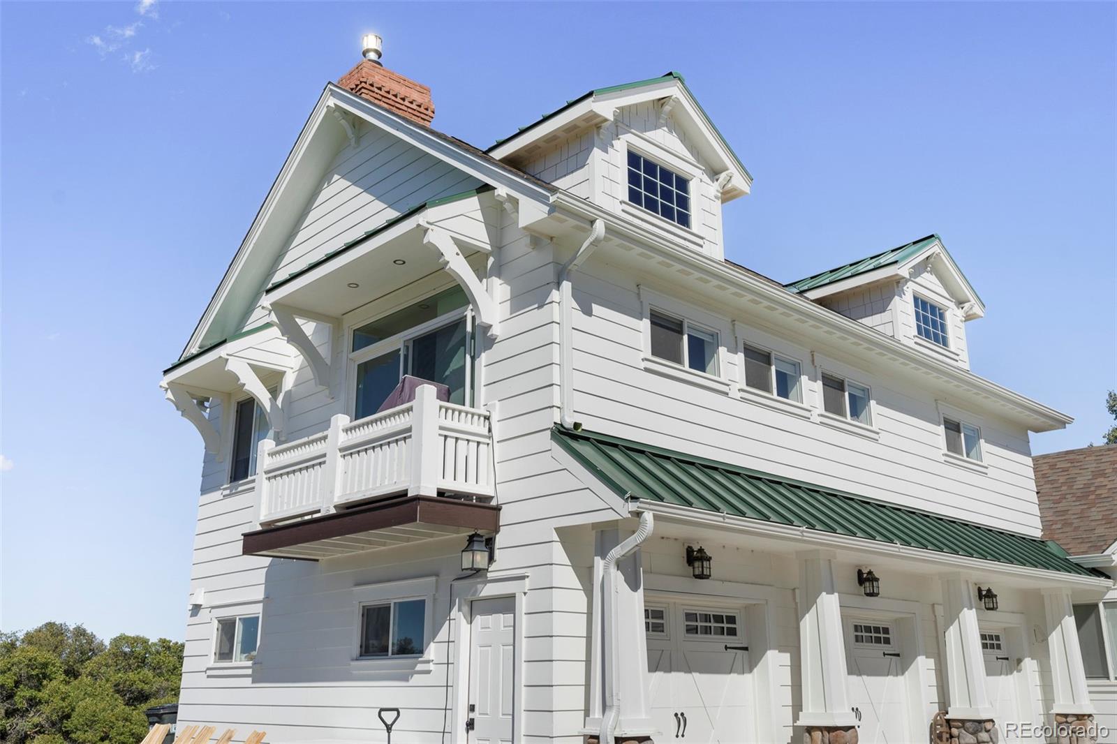 2073 South Perry Park Road Sedalia, CO 80135 - Photo 6 of 41 a front view of a house