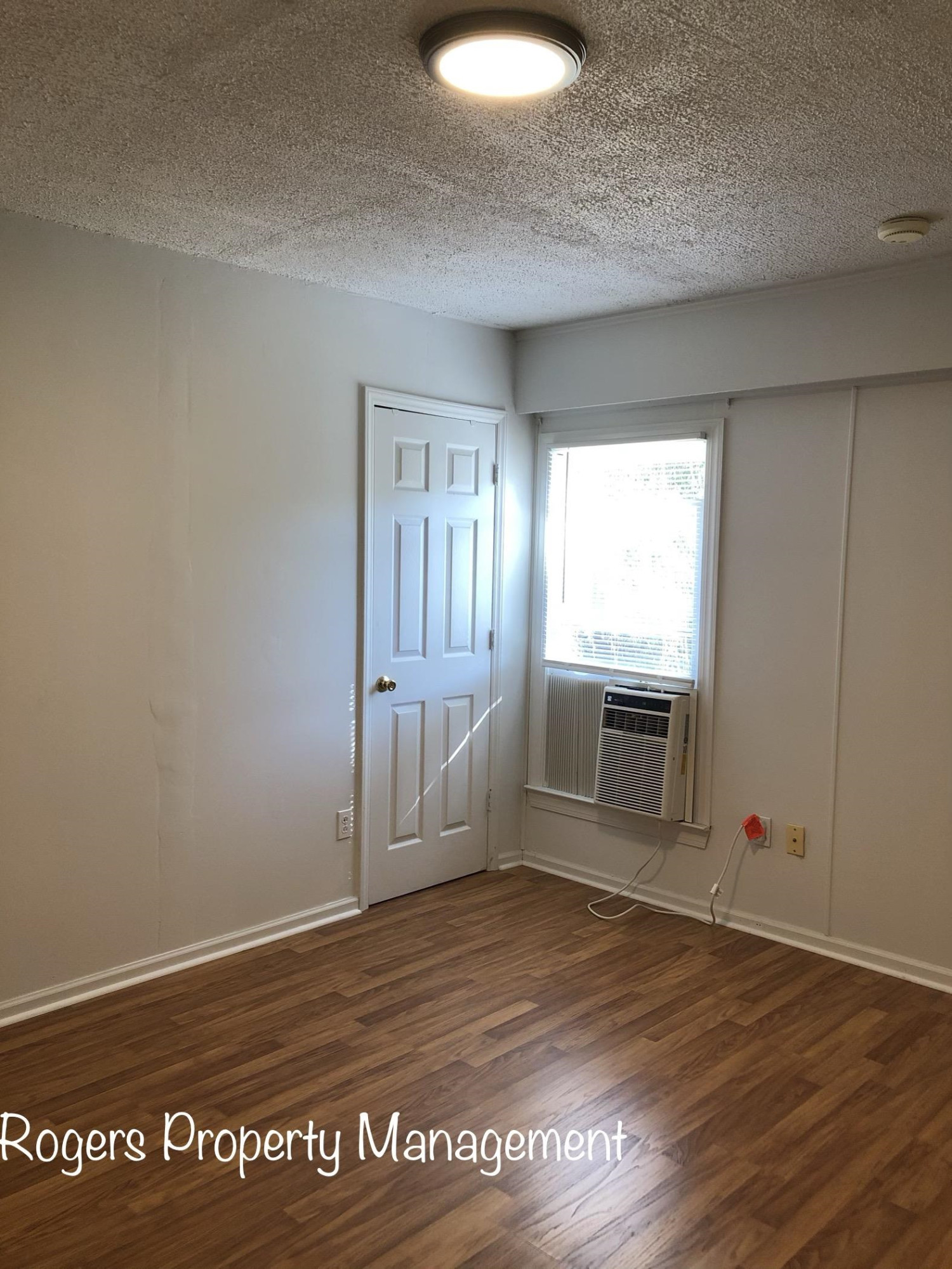5409 Bobbitt Road Apex, NC 27539 - Photo 11 of 19 a view of empty room with wooden floor