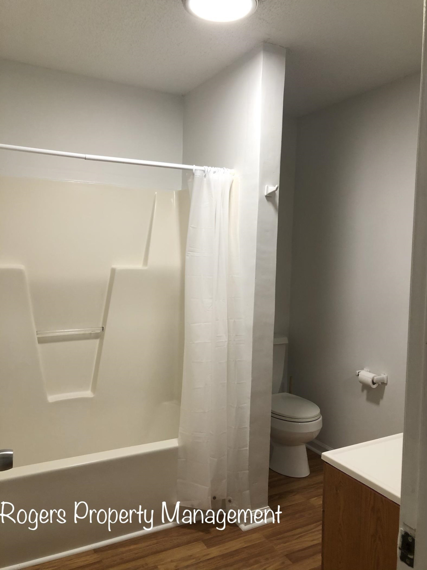 5409 Bobbitt Road Apex, NC 27539 - Photo 13 of 19 a bathroom with a shower and a toilet