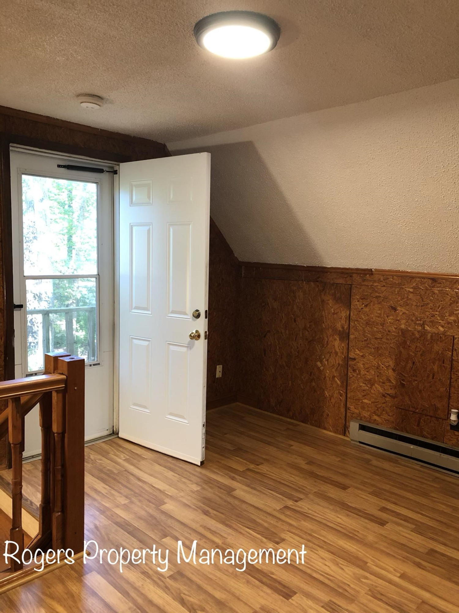 5409 Bobbitt Road Apex, NC 27539 - Photo 16 of 19 a view of a room with wooden floor