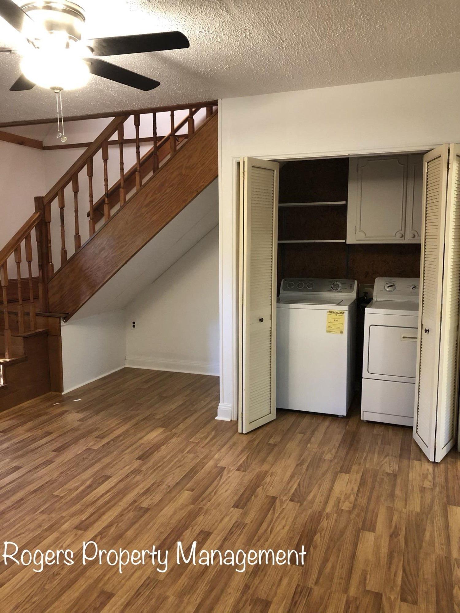 5409 Bobbitt Road Apex, NC 27539 - Photo 9 of 19 a view of empty room with wooden floor and fan
