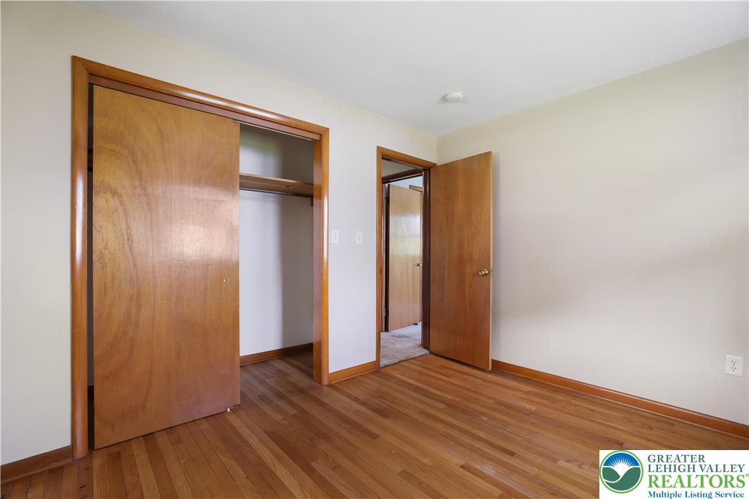 1539 Spring Garden Street Wilson, PA 18042 - Photo 25 of 34 Gleaming hardwood floors and classic wood trim define this versatile secondary bedroom space.