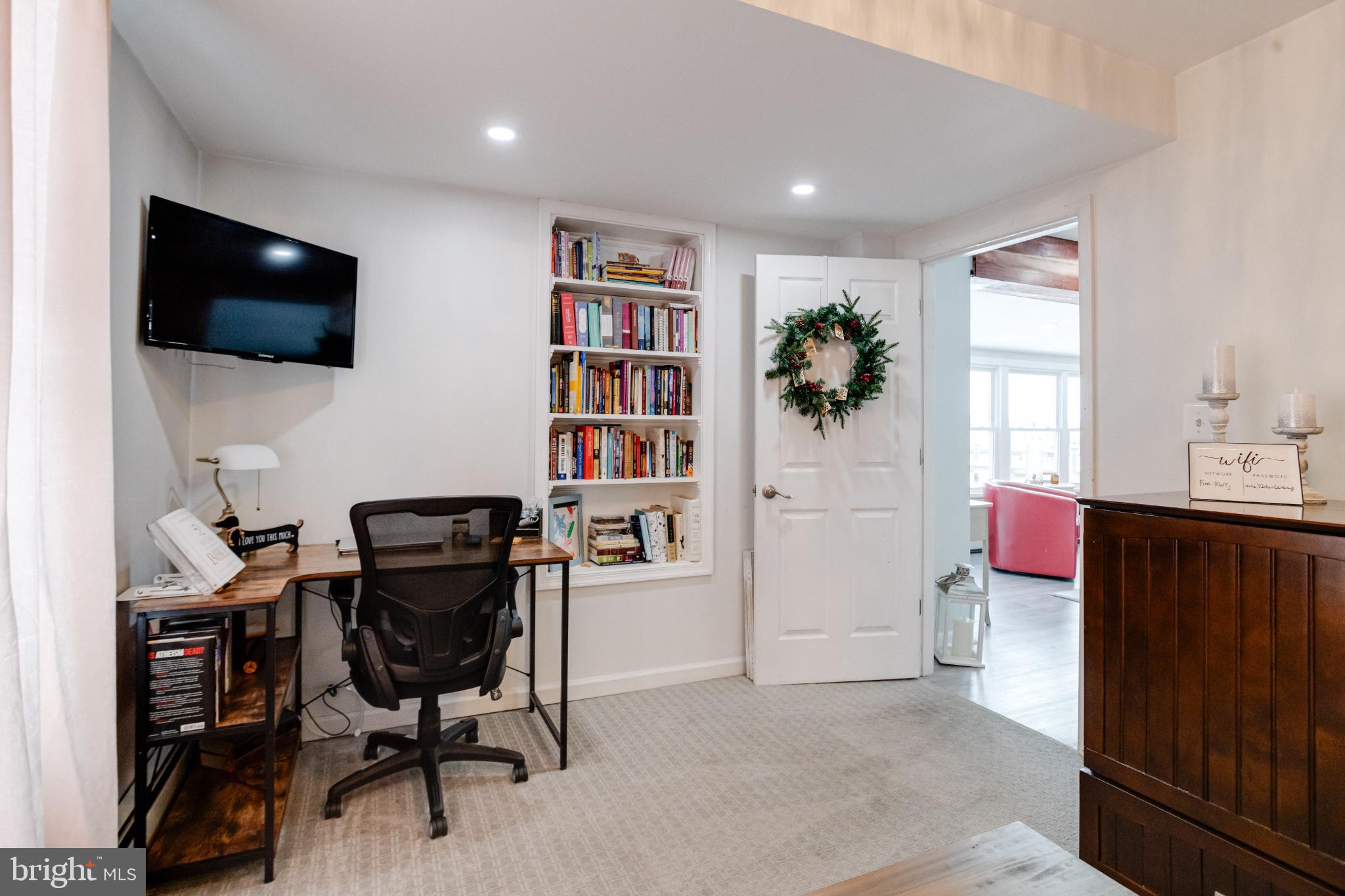1815 Wilson Point Road Middle River, MD 21220 - Photo 30 of 76 a view of a livingroom with furniture and a flat screen tv