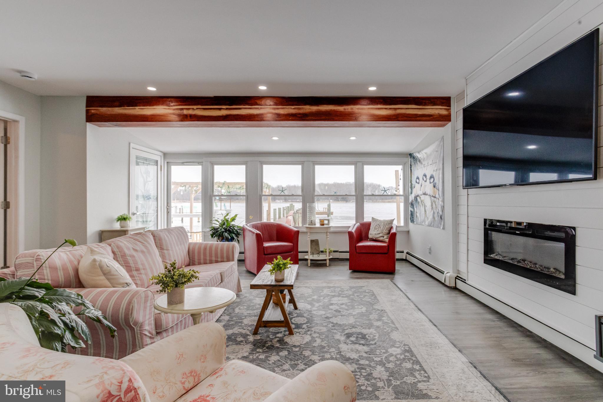 1815 Wilson Point Road Middle River, MD 21220 - Photo 4 of 76 Bright and airy waterfront living space.