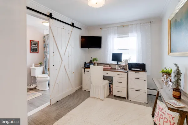 a bathroom with a shower and a toilet