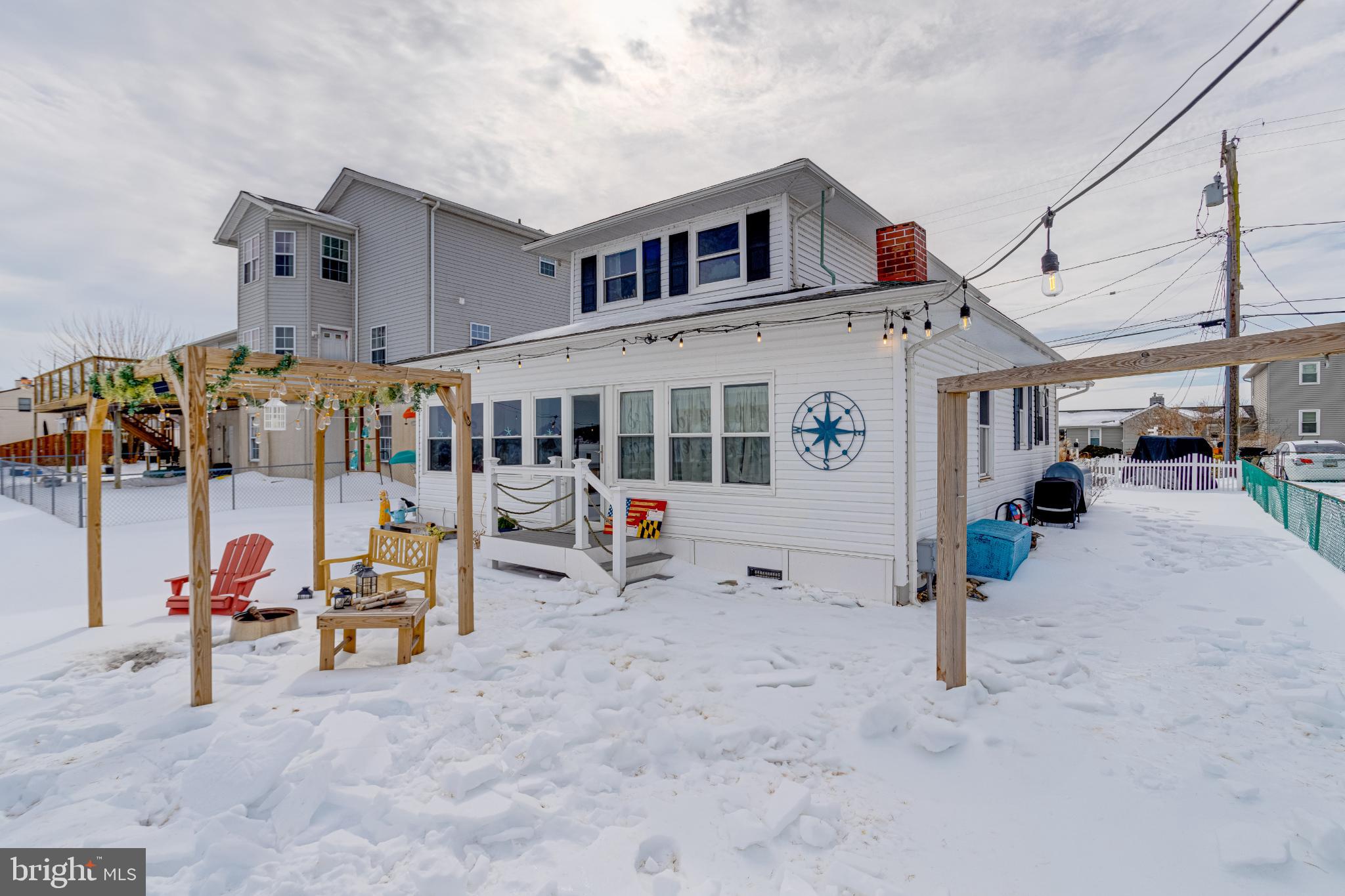 1815 Wilson Point Road Middle River, MD 21220 - Photo 47 of 76 Charming winter retreat with snowy backdrop.