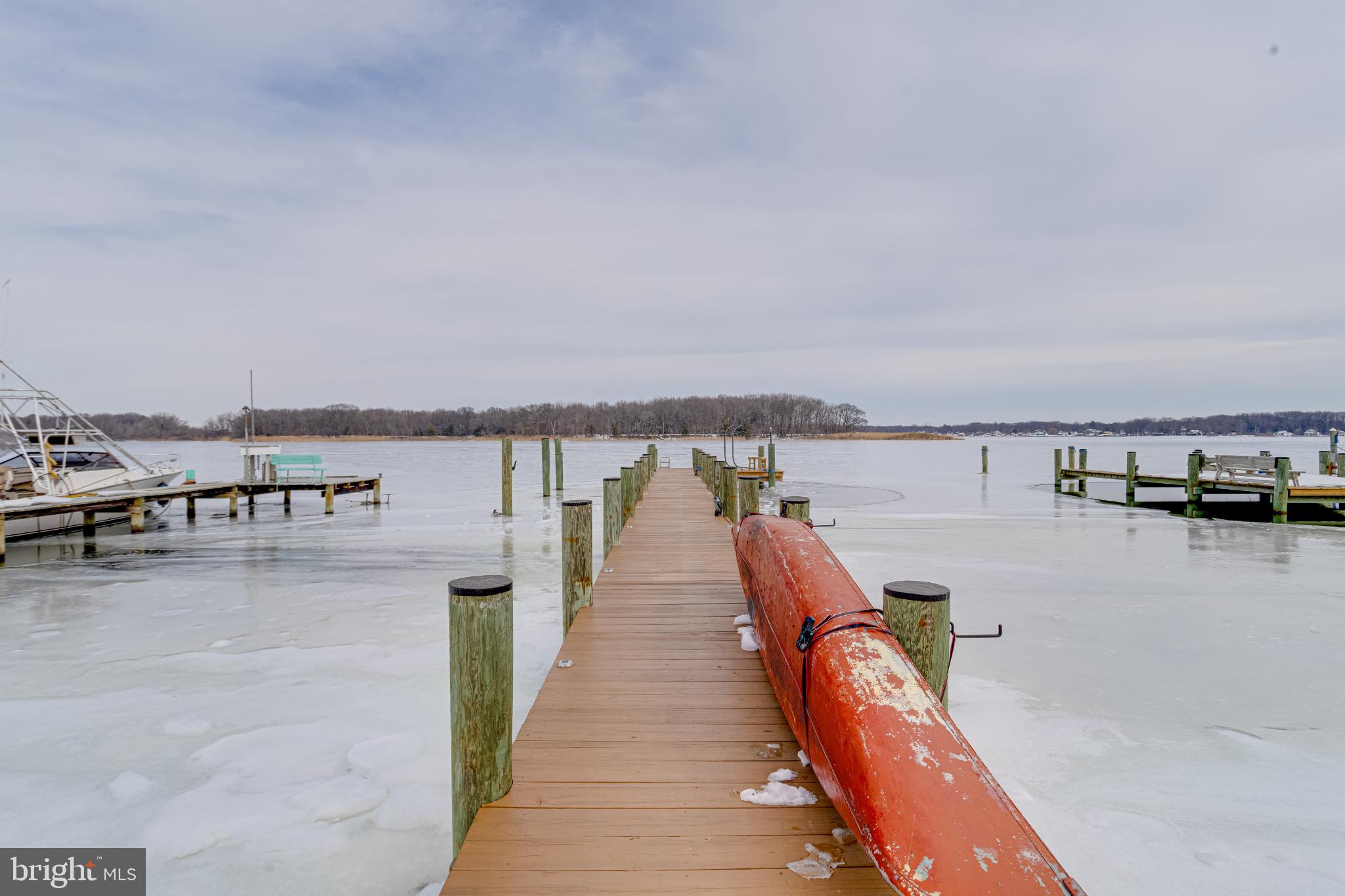 1815 Wilson Point Road Middle River, MD 21220 - Photo 49 of 76 Serene winter dock by a frozen lake.