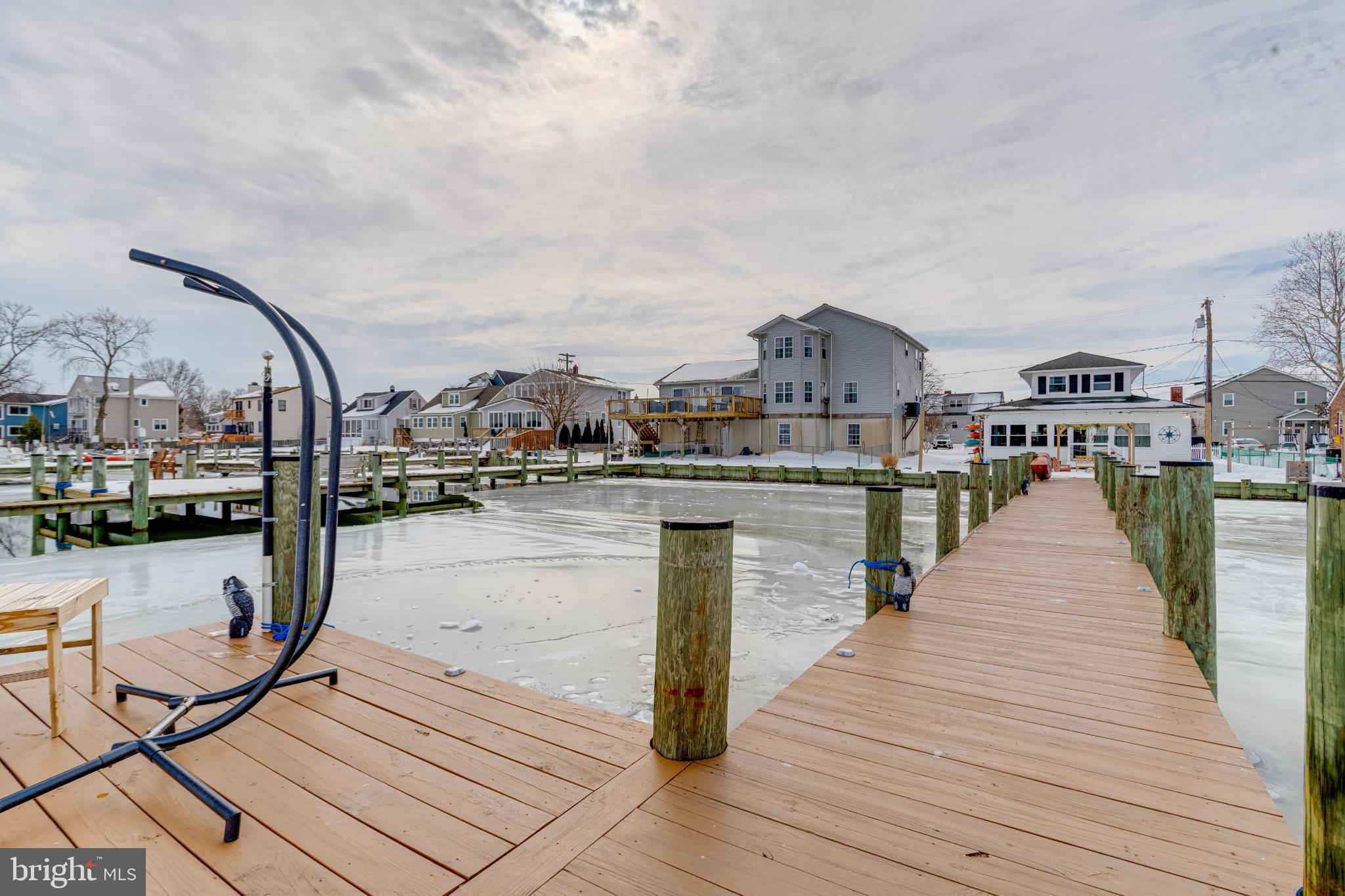 1815 Wilson Point Road Middle River, MD 21220 - Photo 52 of 76 Serene waterfront view with dock and homes.
