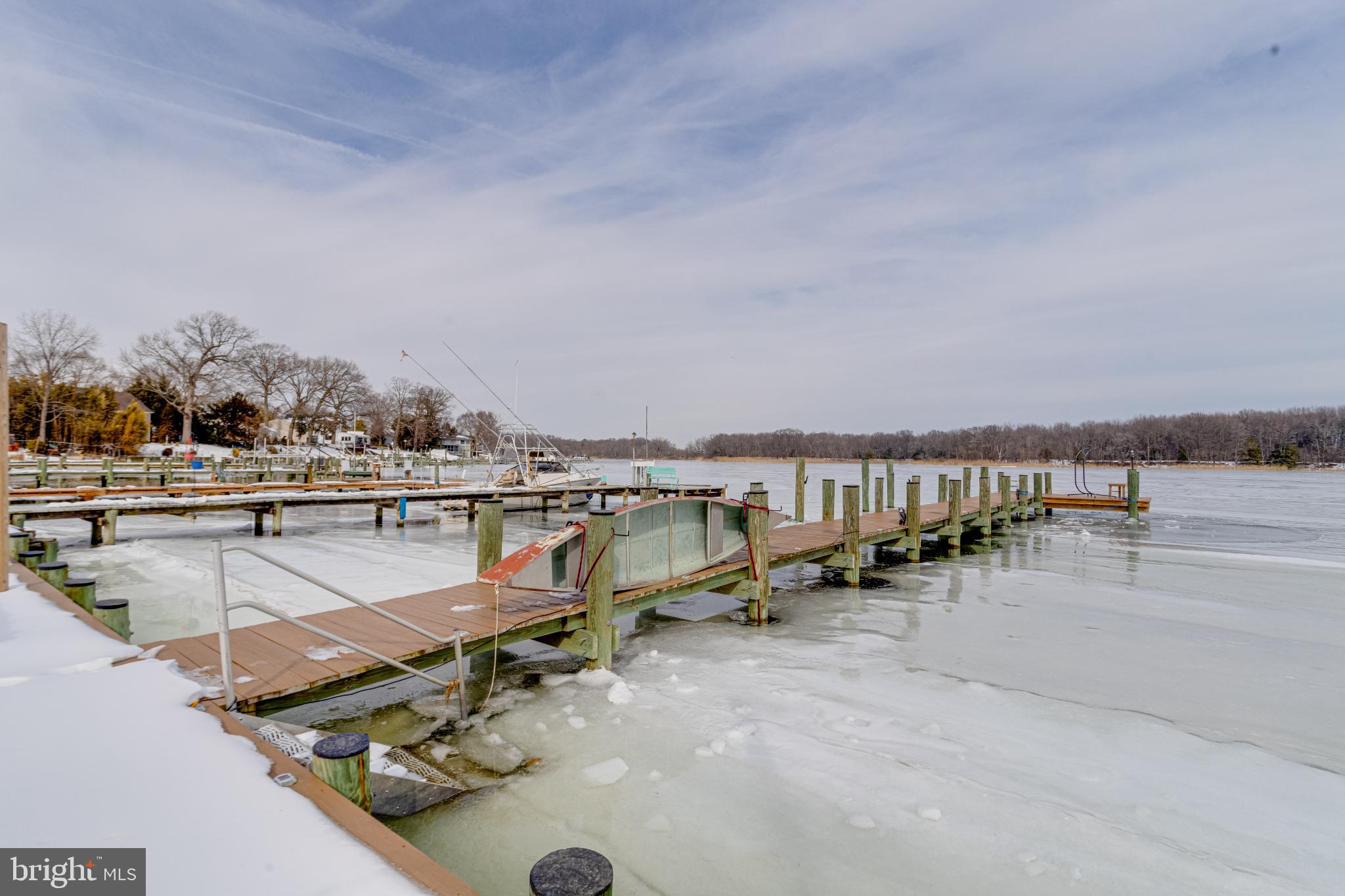 1815 Wilson Point Road Middle River, MD 21220 - Photo 59 of 76 Frozen docks by a serene winter lake.