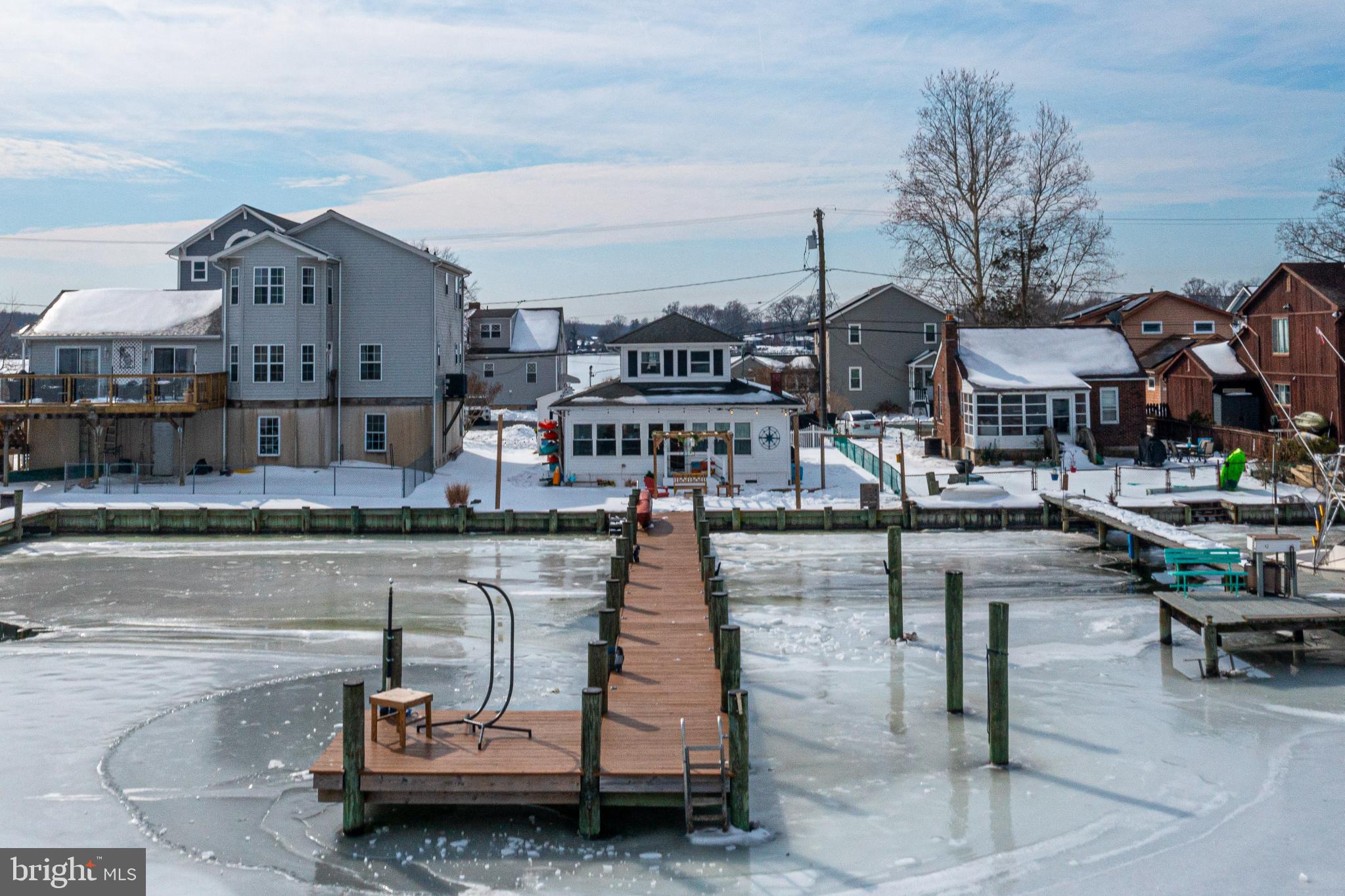 1815 Wilson Point Road Middle River, MD 21220 - Photo 62 of 76 Winter's embrace on a serene waterfront.