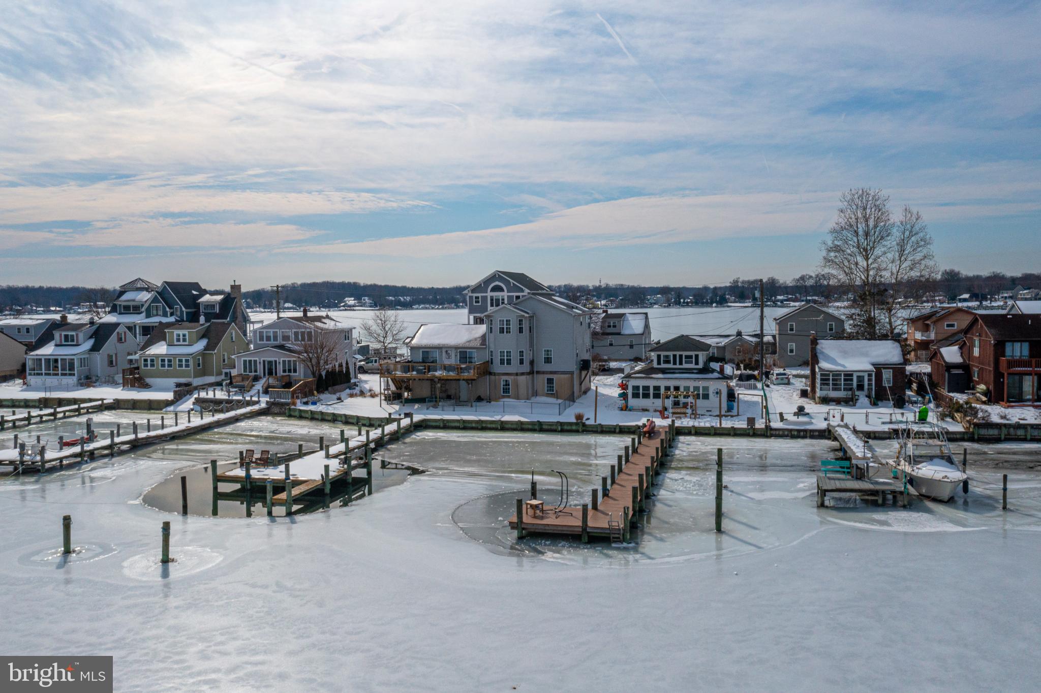 1815 Wilson Point Road Middle River, MD 21220 - Photo 65 of 76 Frozen waterfront charm in winter's embrace.