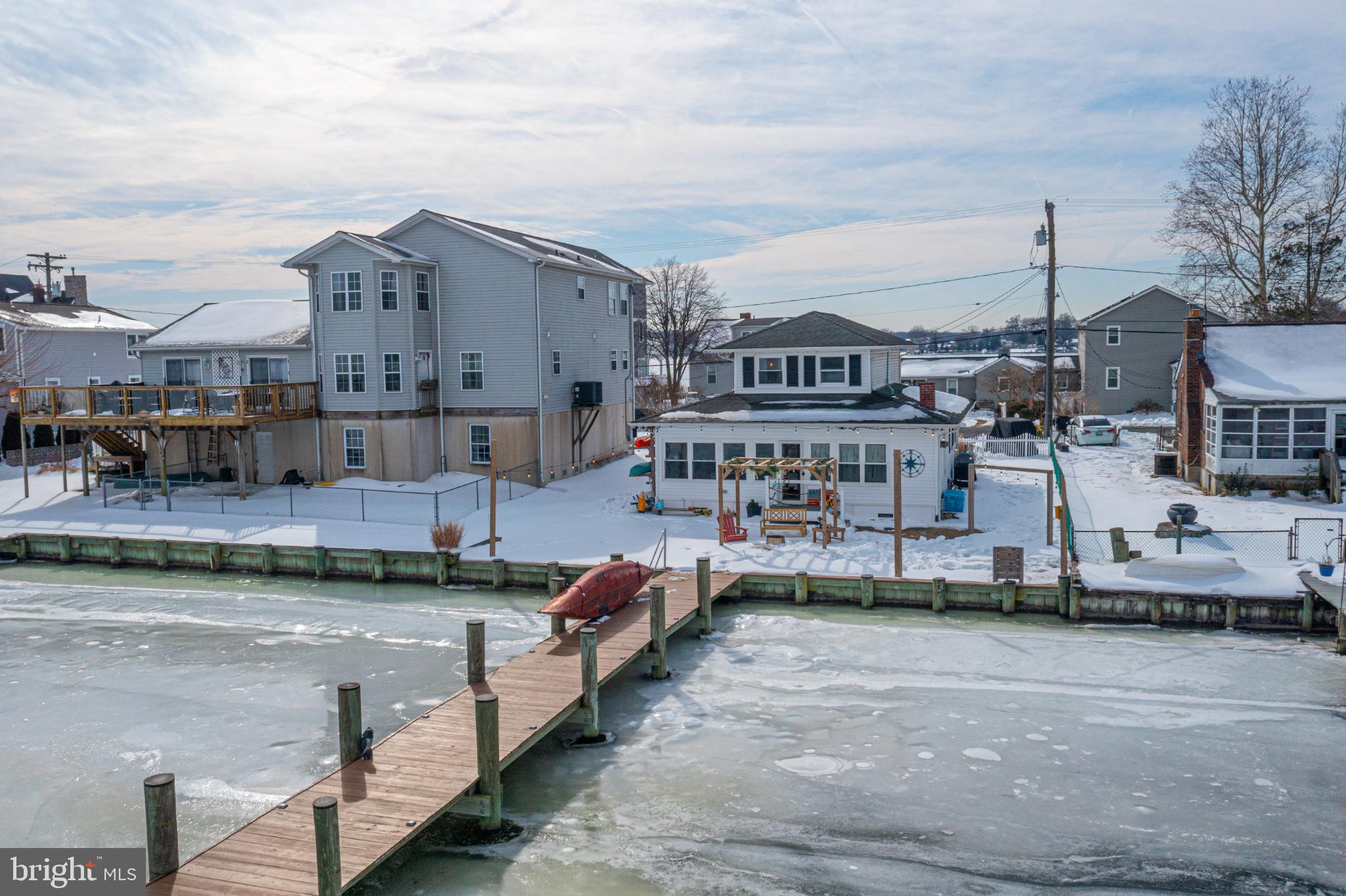 1815 Wilson Point Road Middle River, MD 21220 - Photo 68 of 76 Charming waterfront homes in winter's embrace.