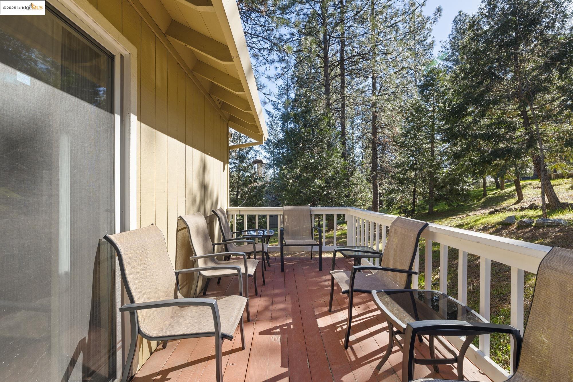 12080 Breckenridge Road Groveland, CA 95321 - Photo 27 of 48 a view of balcony with furniture and garden