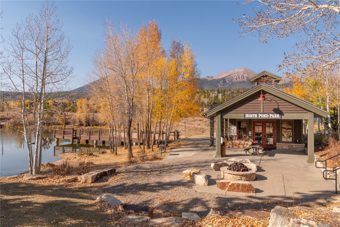 2206 Hamilton Creek Road Silverthorne, CO 80498 - Photo 39 of 39 Surrounding community featuring a patio, a water and mountain view, and an outdoor fire pit
