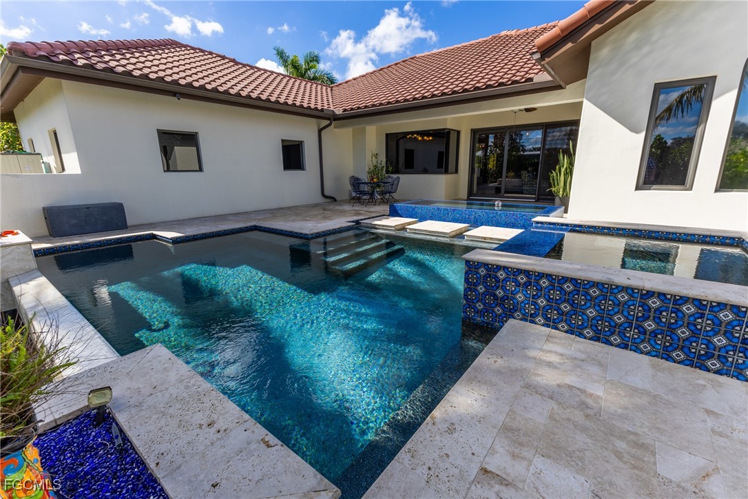 1971 Mitchell Avenue Alva, FL 33920 - Photo 12 of 50 a front view of house with yard outdoor seating and barbeque oven