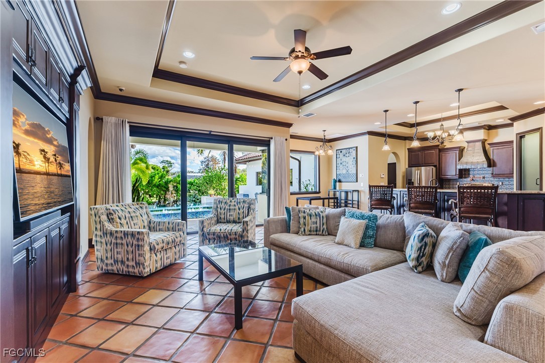 1971 Mitchell Avenue Alva, FL 33920 - Photo 22 of 50 a living room with furniture and a flat screen tv