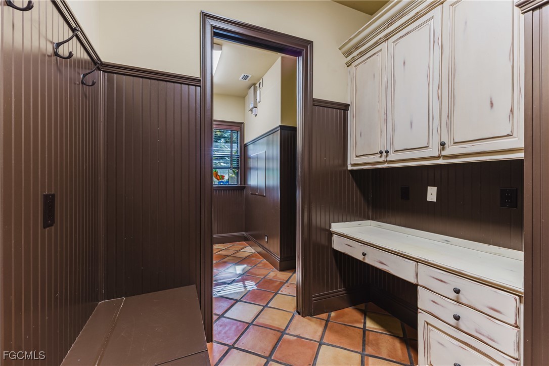 1971 Mitchell Avenue Alva, FL 33920 - Photo 38 of 50 a kitchen with a refrigerator and cabinets