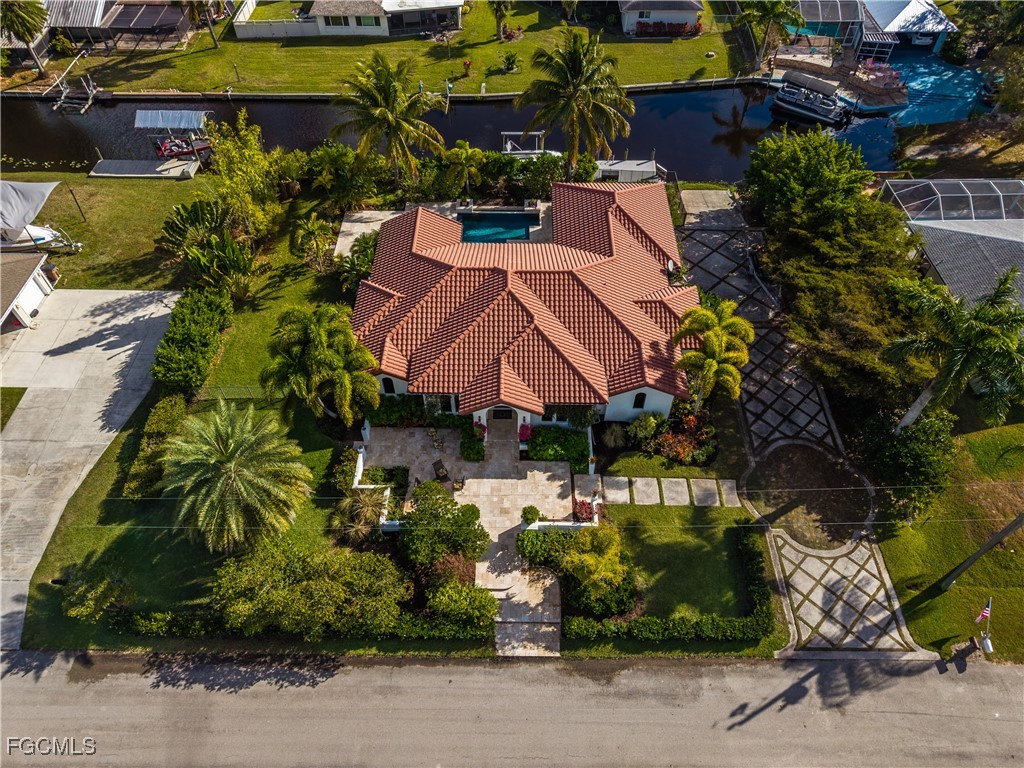 1971 Mitchell Avenue Alva, FL 33920 - Photo 5 of 50 an aerial view of a house with a garden