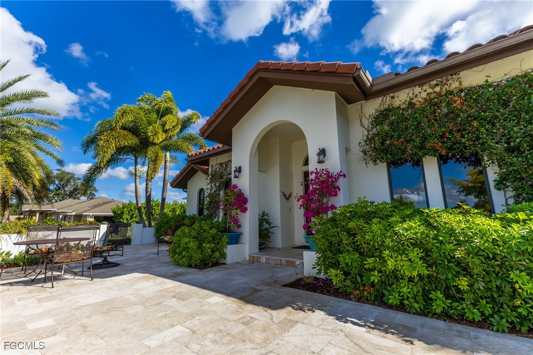 1971 Mitchell Avenue Alva, FL 33920 - Photo 6 of 50 a front view of a house with garden
