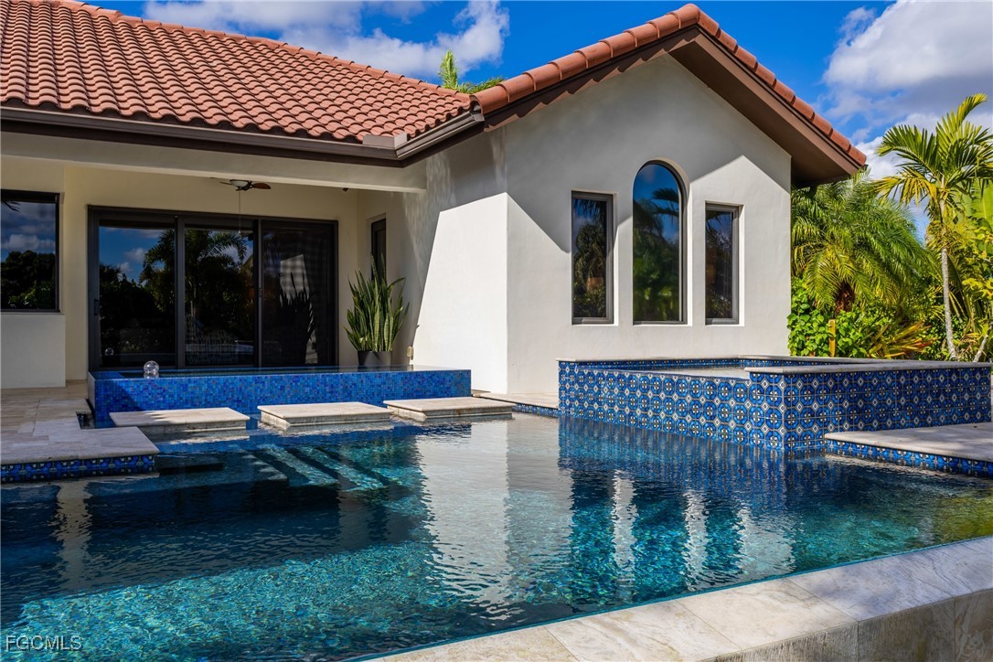 1971 Mitchell Avenue Alva, FL 33920 - Photo 10 of 50 a view of a house with backyard porch and sitting area