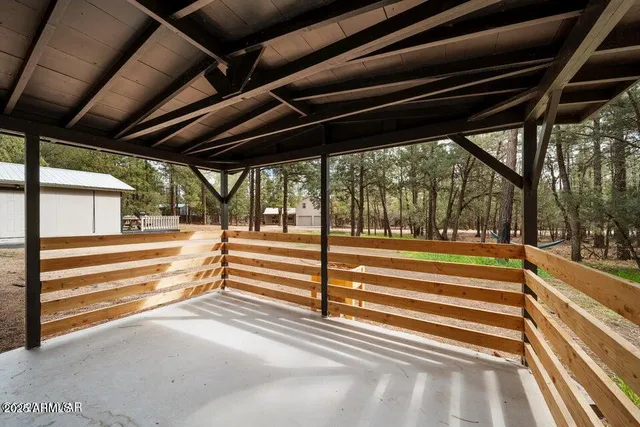 a view of balcony with wooden floor and outdoor space
