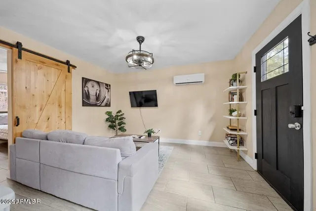 a kitchen with a sink stove and microwave