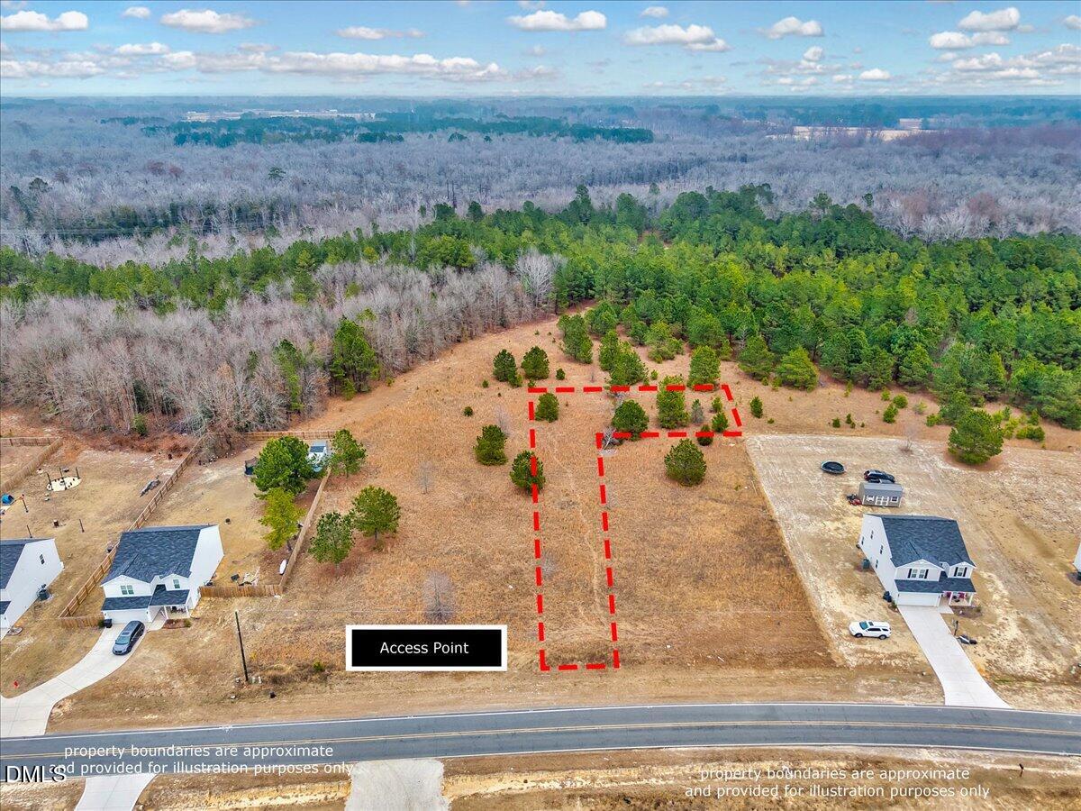Lot 4 Blue Springs Road Red Springs, NC 28377 - Photo 3 of 9 an aerial view of a house with a yard