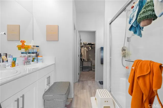 a hallway with a sink and a couch