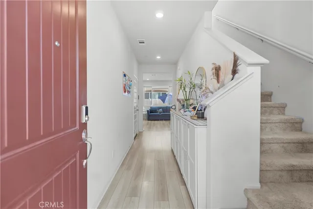 a view of a hallway view with staircase