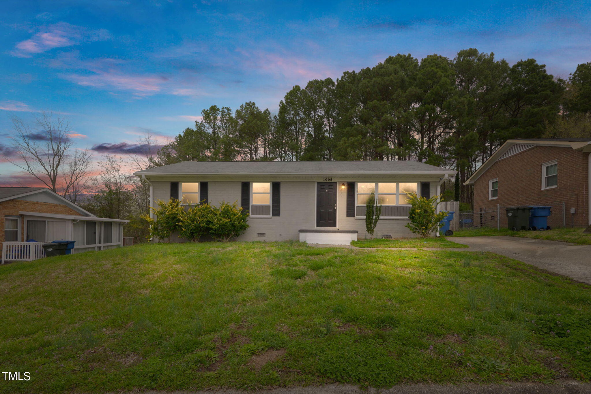 1005 Delray Street Durham, NC 27713 - Photo 1 of 18 a front view of house with yard and green space