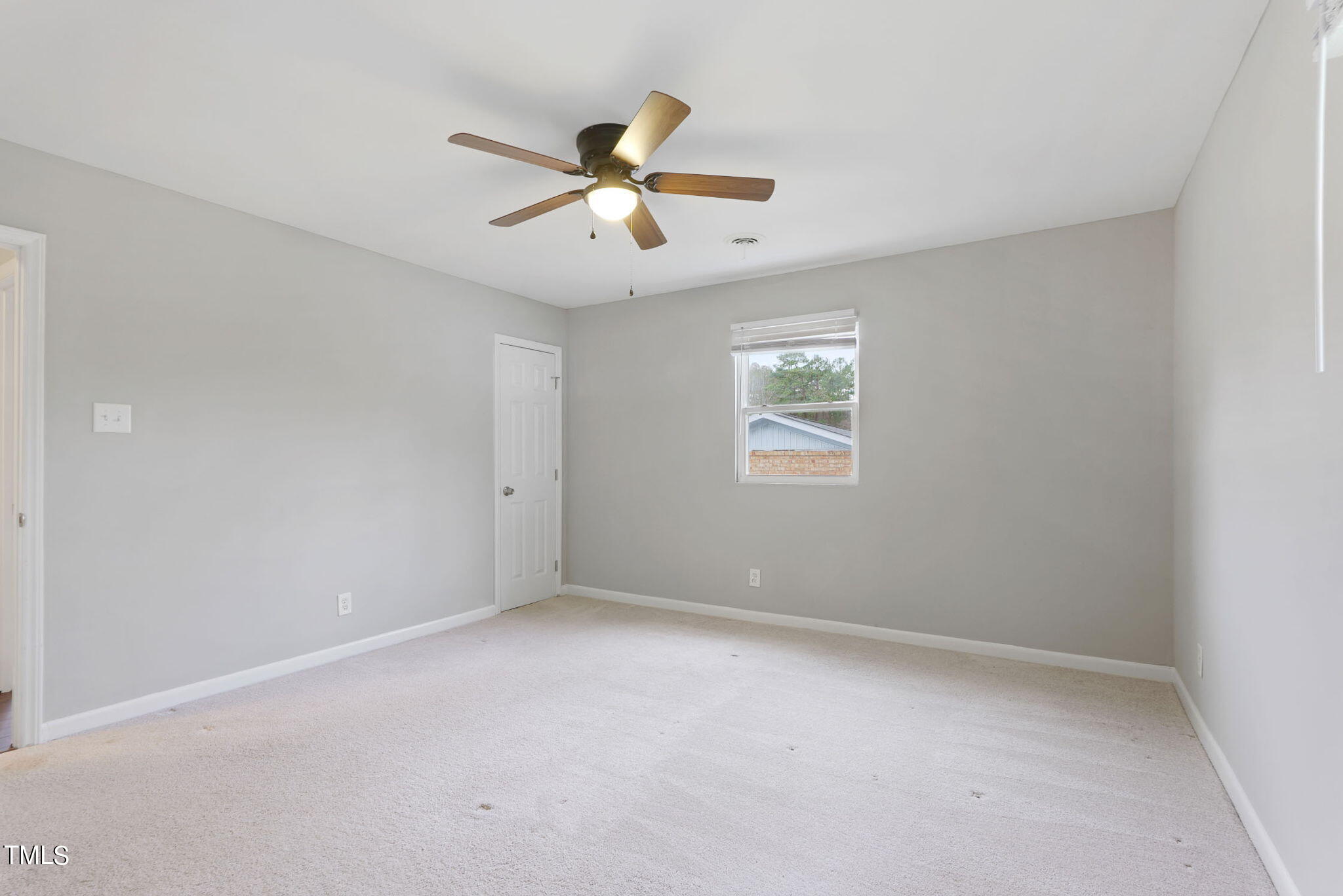 1005 Delray Street Durham, NC 27713 - Photo 12 of 18 a view of an empty room with a window
