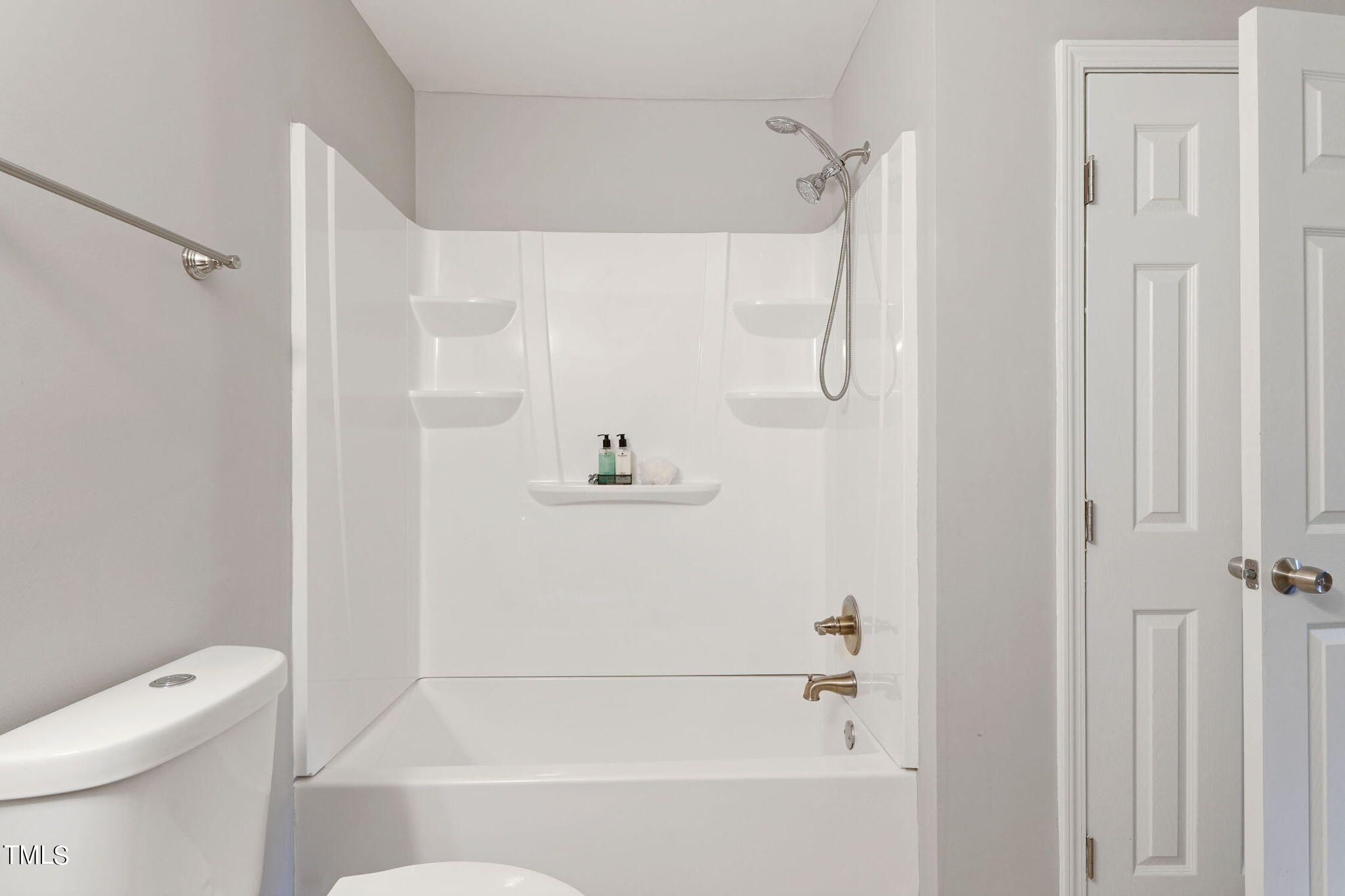 1005 Delray Street Durham, NC 27713 - Photo 18 of 18 a bathroom with a shower and a toilet