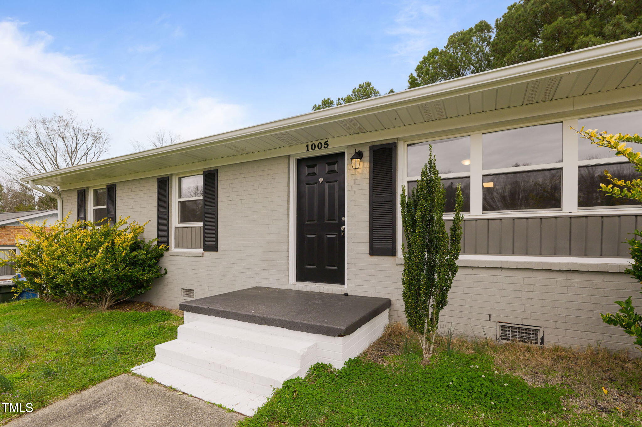 1005 Delray Street Durham, NC 27713 - Photo 2 of 18 a front view of a house with garden