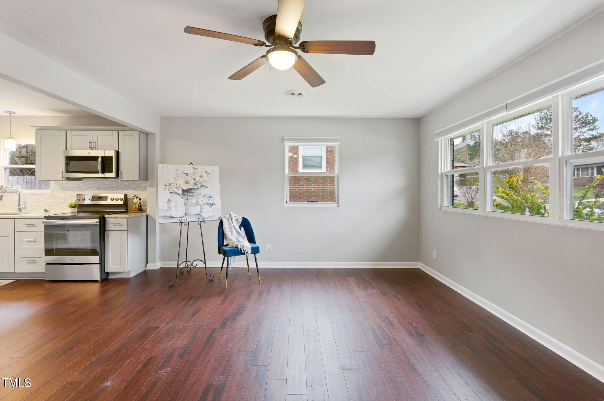 1005 Delray Street Durham, NC 27713 - Photo 8 of 18 a living room with furniture and a wooden floor