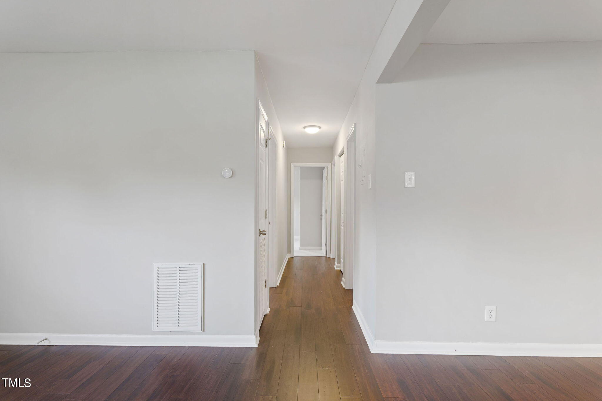 1005 Delray Street Durham, NC 27713 - Photo 10 of 18 a view of a hallway with wooden floor