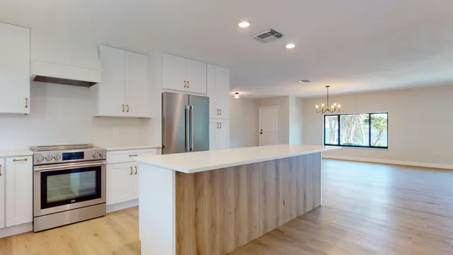 a bathroom with a shower and a toilet