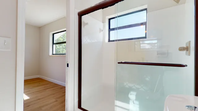 a view of an empty room and window