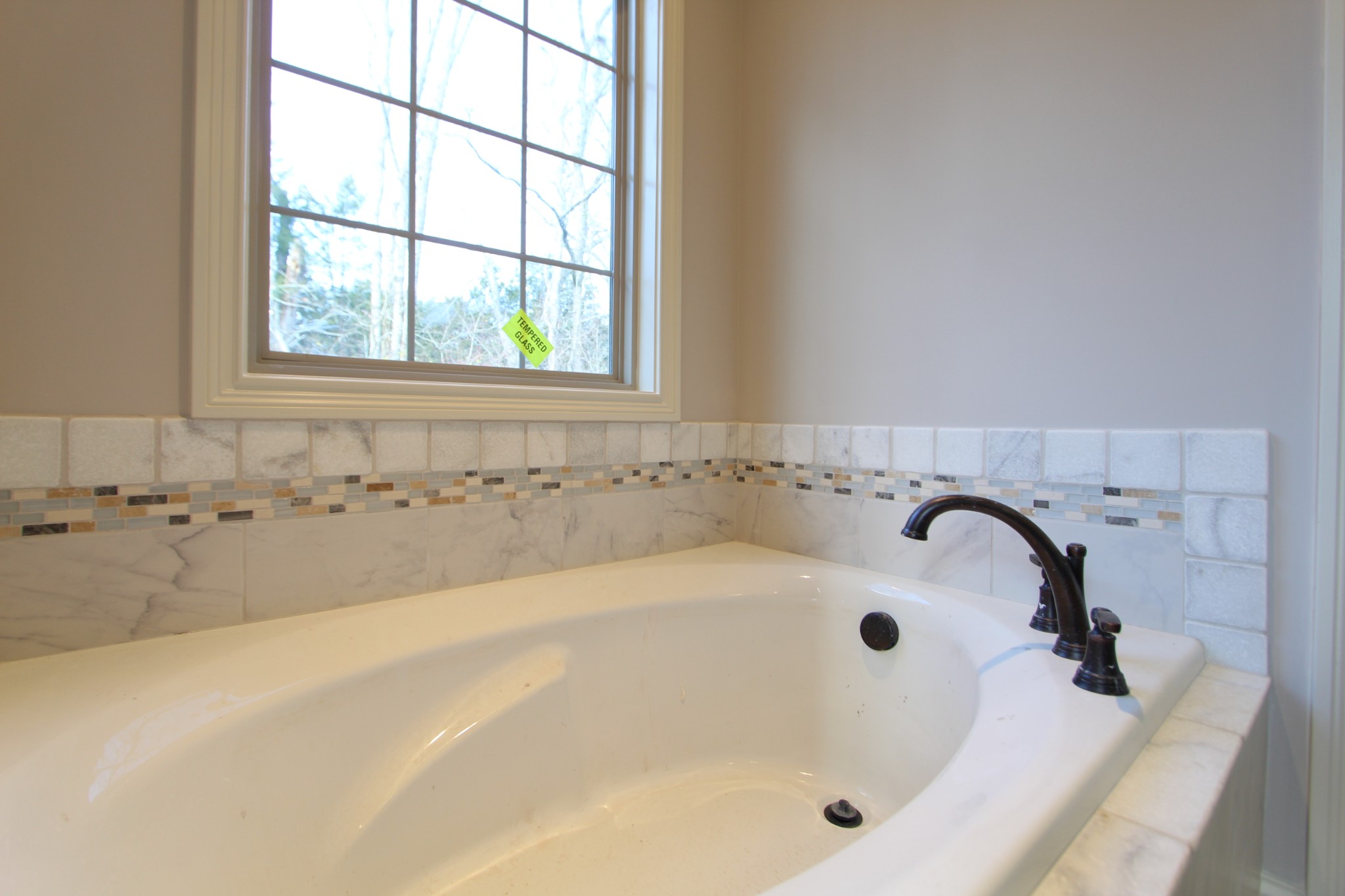 253 Ridgewater Way, Unit 85 Mount Juliet, TN 37122 - Photo 17 of 23 a bathroom with a bathtub