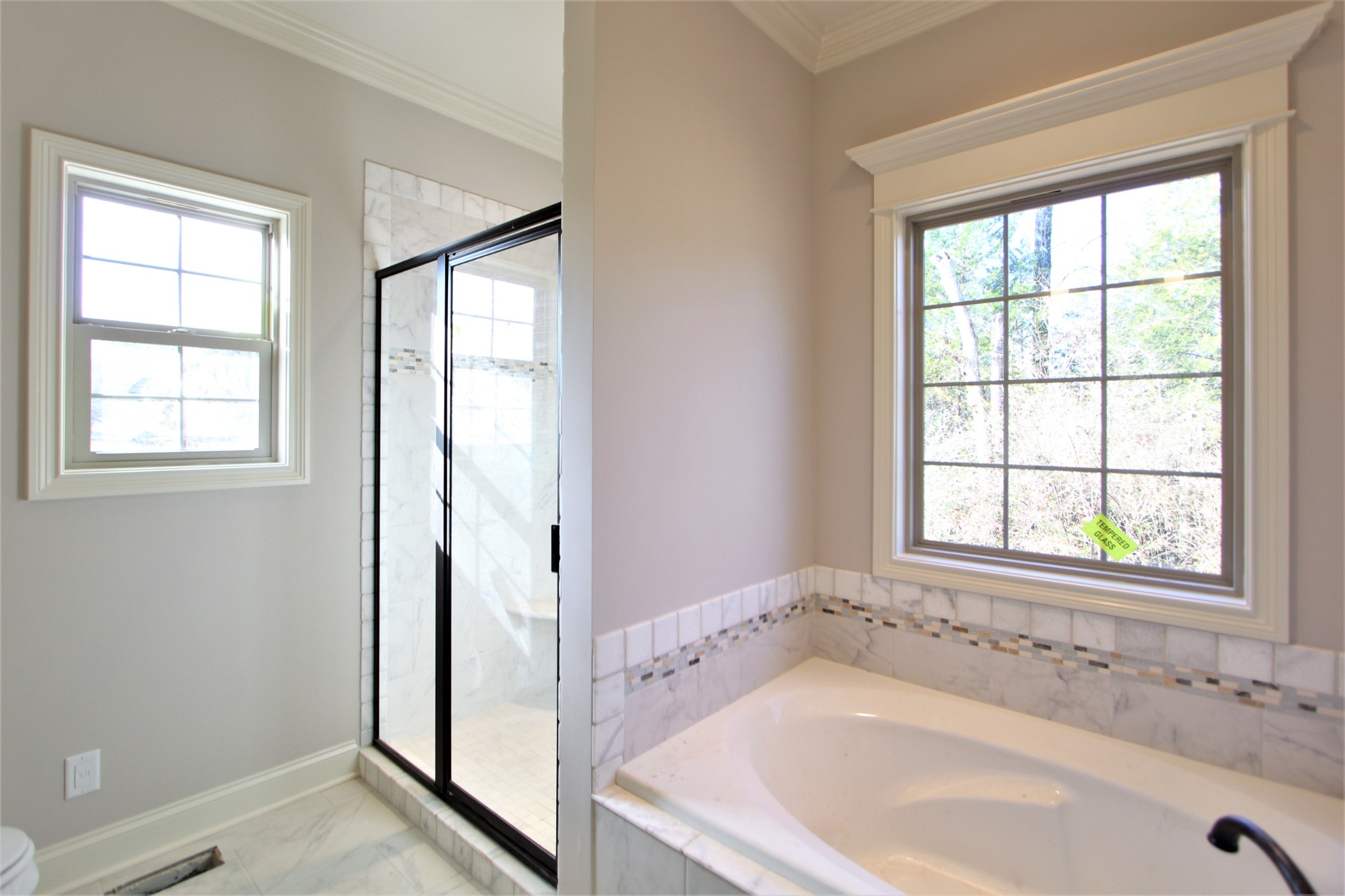 253 Ridgewater Way, Unit 85 Mount Juliet, TN 37122 - Photo 18 of 23 a white bath tub sitting next to a window