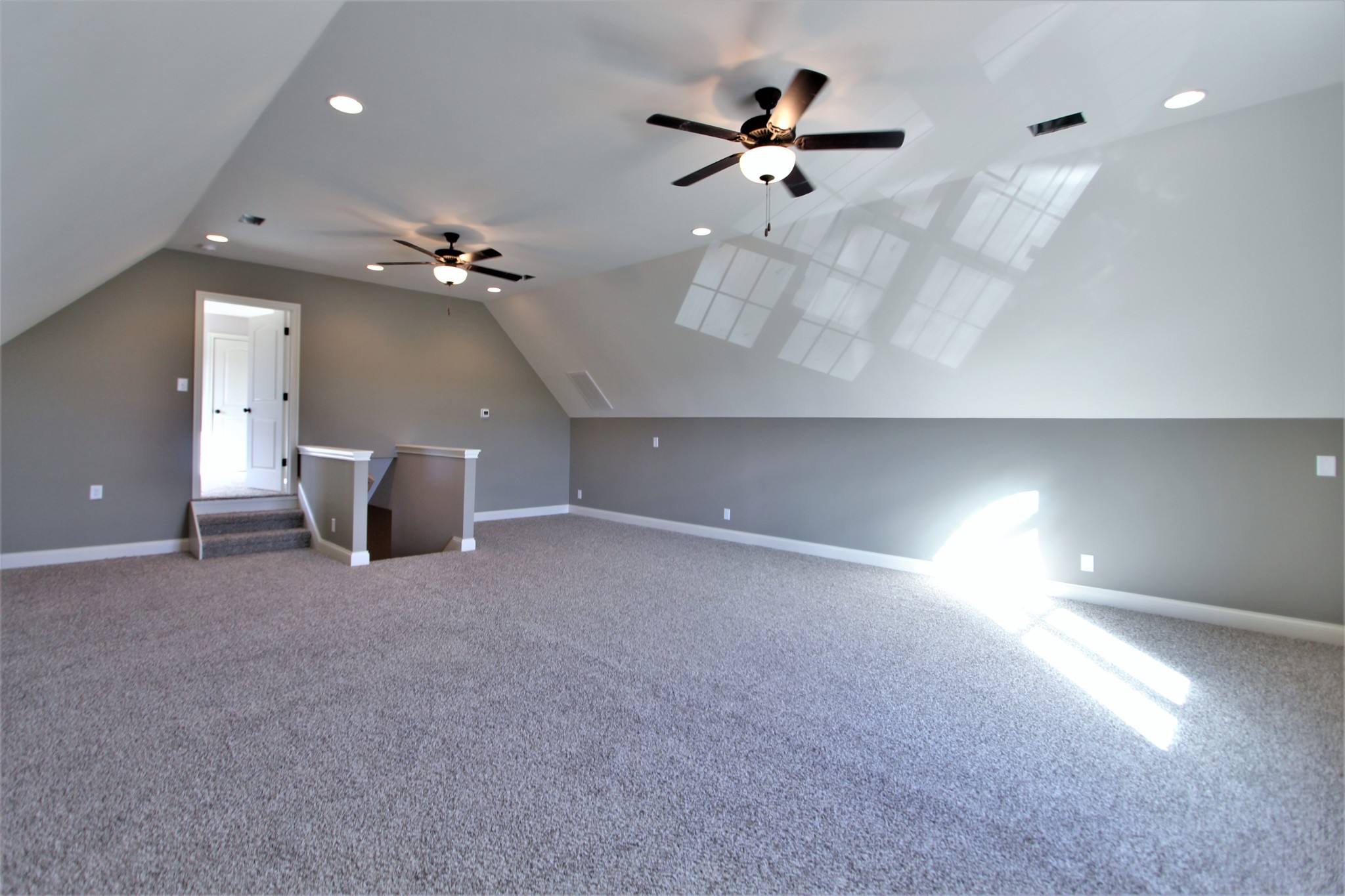 253 Ridgewater Way, Unit 85 Mount Juliet, TN 37122 - Photo 20 of 23 a view of a livingroom and a chandelier fan