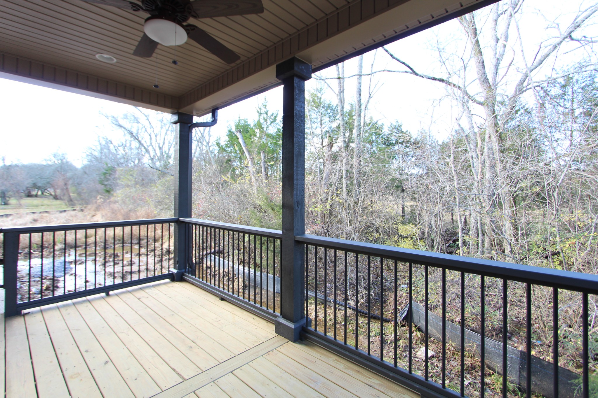 253 Ridgewater Way, Unit 85 Mount Juliet, TN 37122 - Photo 22 of 23 a view of balcony with wooden floor